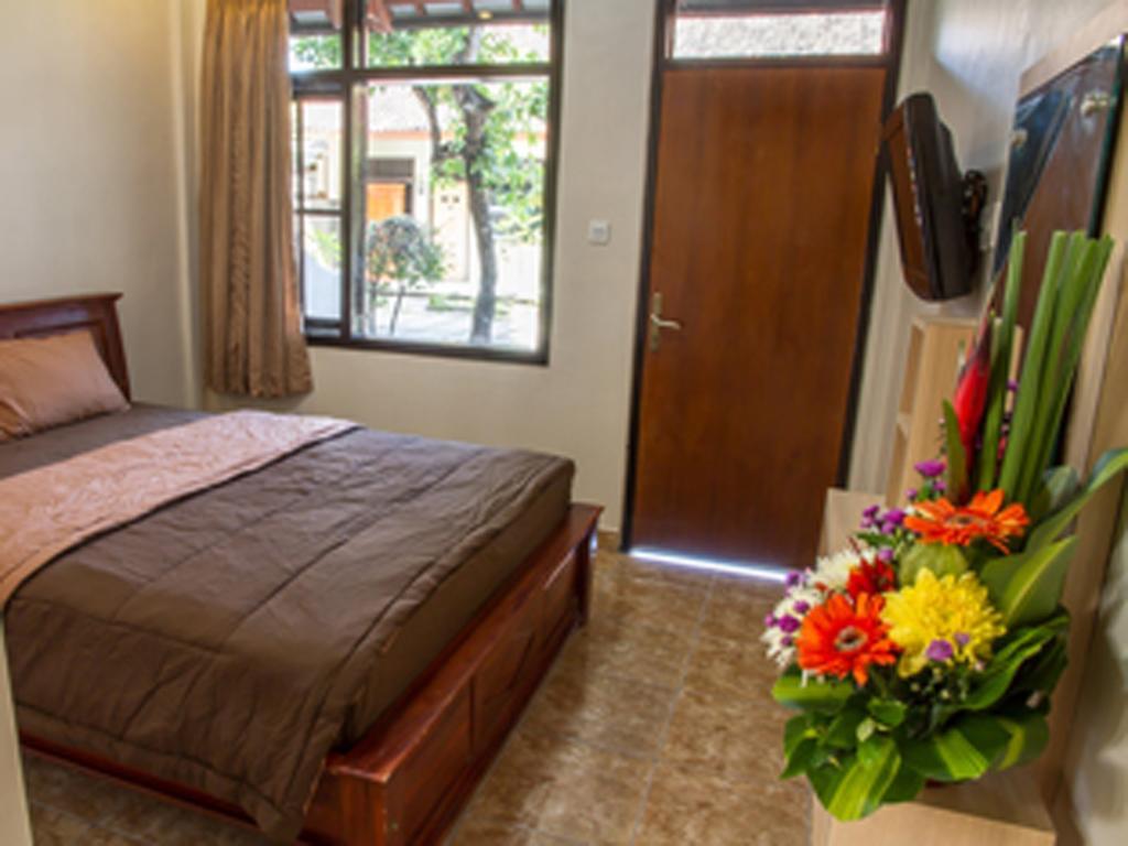 Karana Residence Kuta Lombok Værelse billede